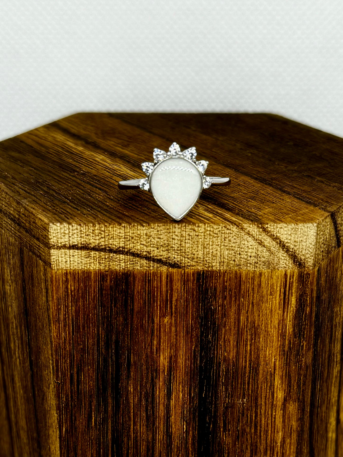 pear ring with diamond crown