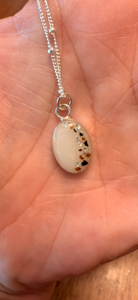 silver circle/oval pendant